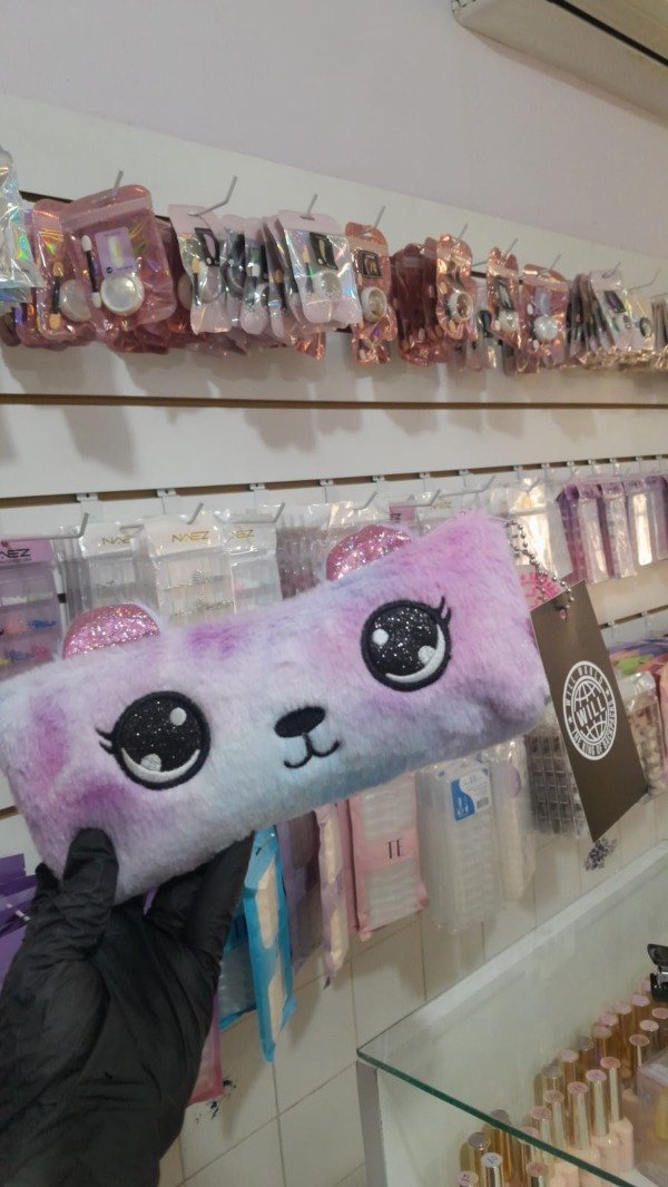Cartuchera / porta cosméticos de peluche 2
