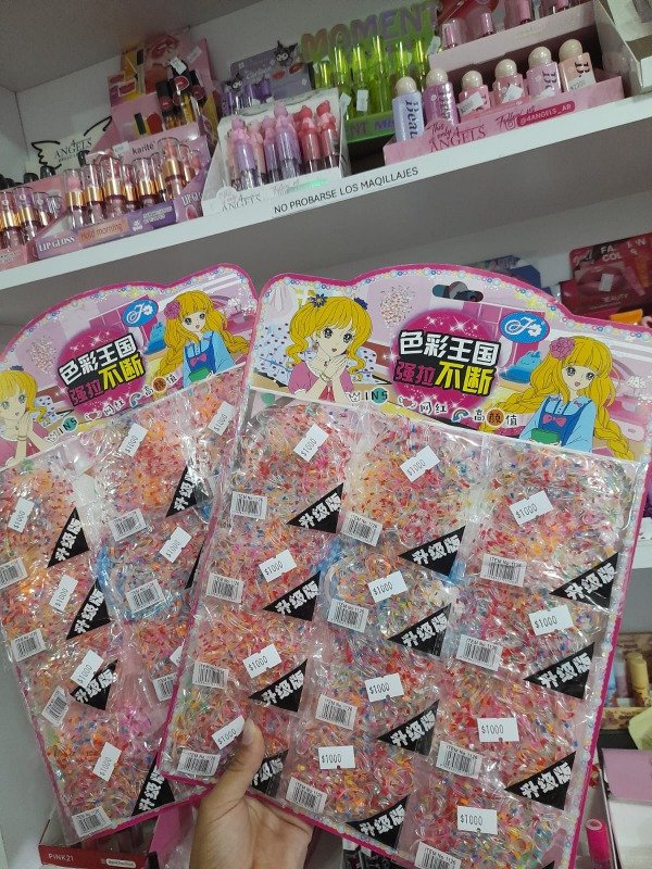 Gomitas para pelo transparentes con colores varios por paquetito